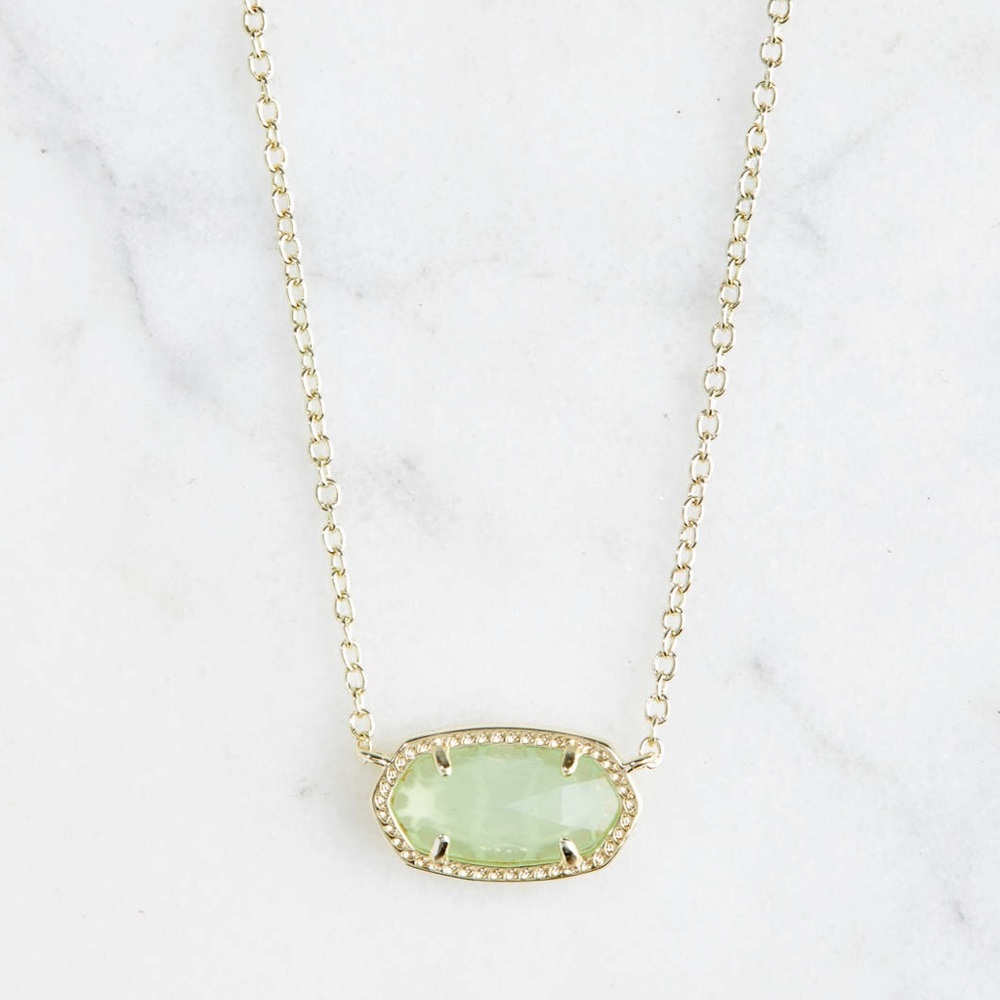 Kendra Scott necklace.